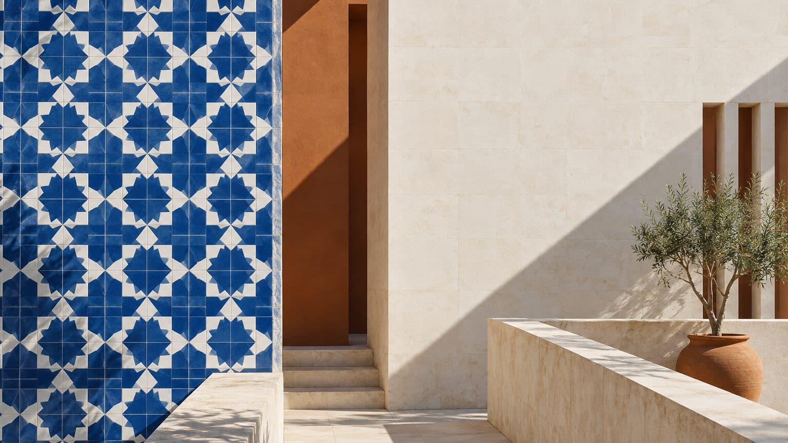 Mediterranean light across a facade with azulejo geometry